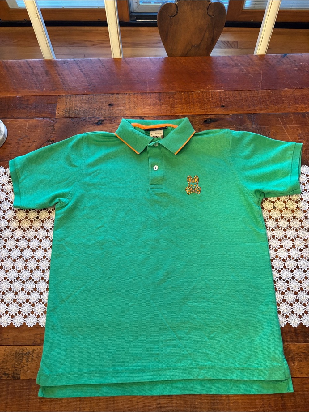 Boy’s Psycho Bunny Green Polo with Orange Trim Size XL.